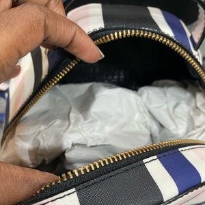 Blue/white/pink/black Mini backpack.